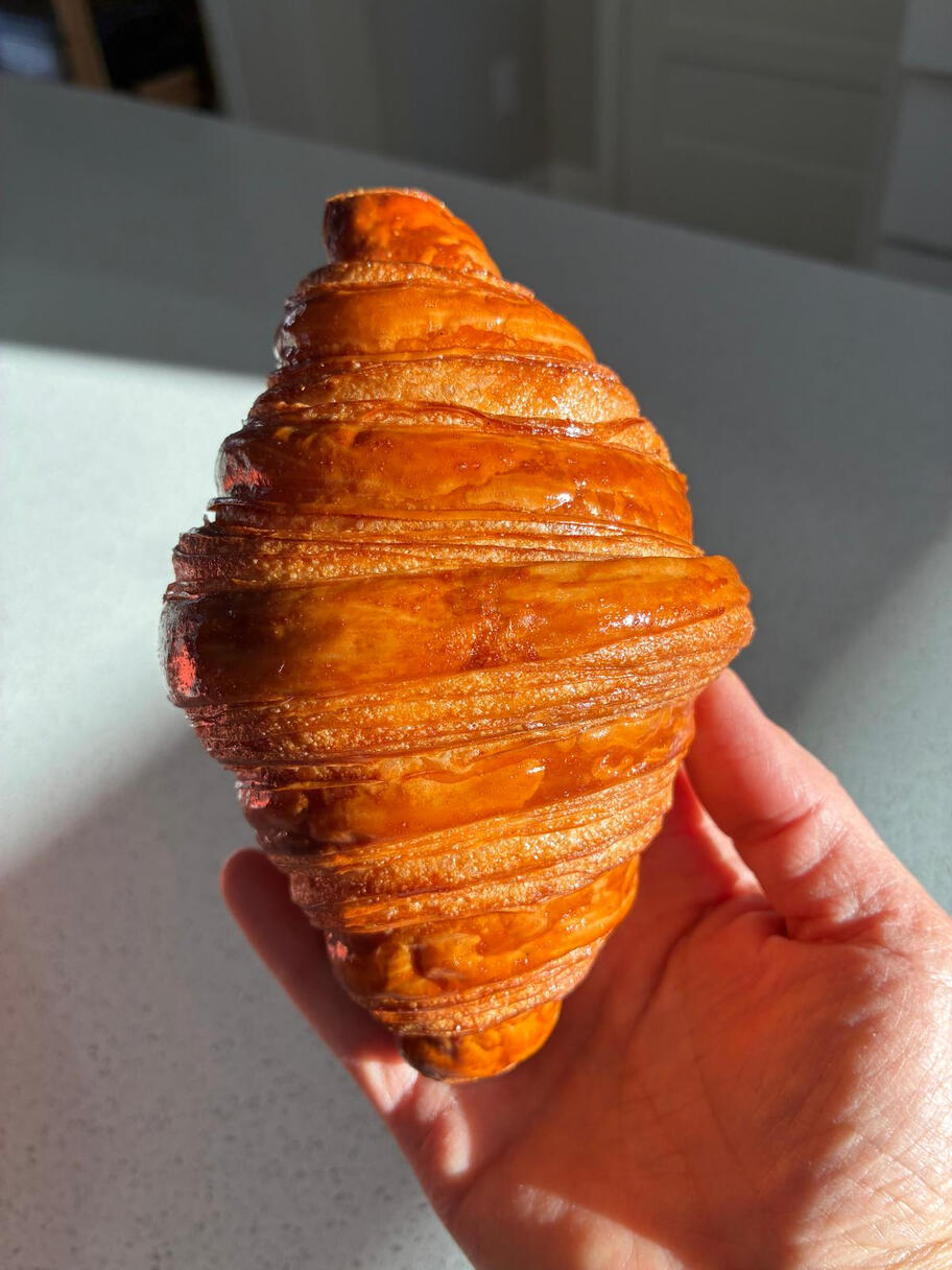 Freshly baked artisan croissants made from scratch in a home kitchen